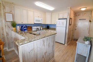 Fridge, microwave, oven, stovetop - Perfect getaway. 2 bedroom oceanfront condo. Outdoor pool. (North Myrtle Beach)