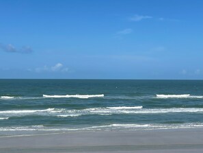 On the beach, sun-loungers, beach towels