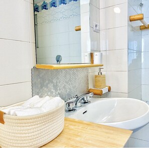 Hair dryer, towels, soap, toilet paper