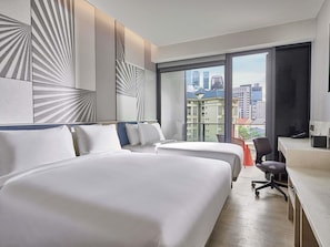 Deluxe Room, Multiple Beds, Balcony | Minibar, desk, soundproofing, free WiFi