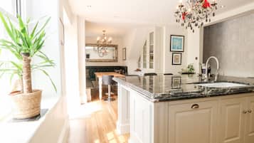 Fridge, electric kettle, toaster, cookware/dishes/utensils