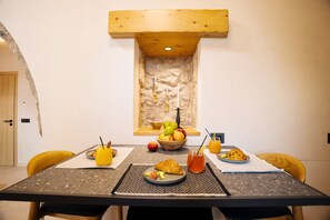 2 Bedroom Sea View Suite, Nostos | Dining room - Mirthea Suites (Agios Vasileios)