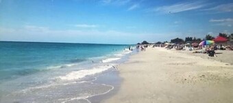 MAGNIFICENT! LUXURY WATERFRONT HOME;BIG HEATED POOL-80’ DOCK! 5 MIN FISH VILLAGE