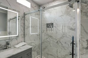 Shower, hair dryer, towels