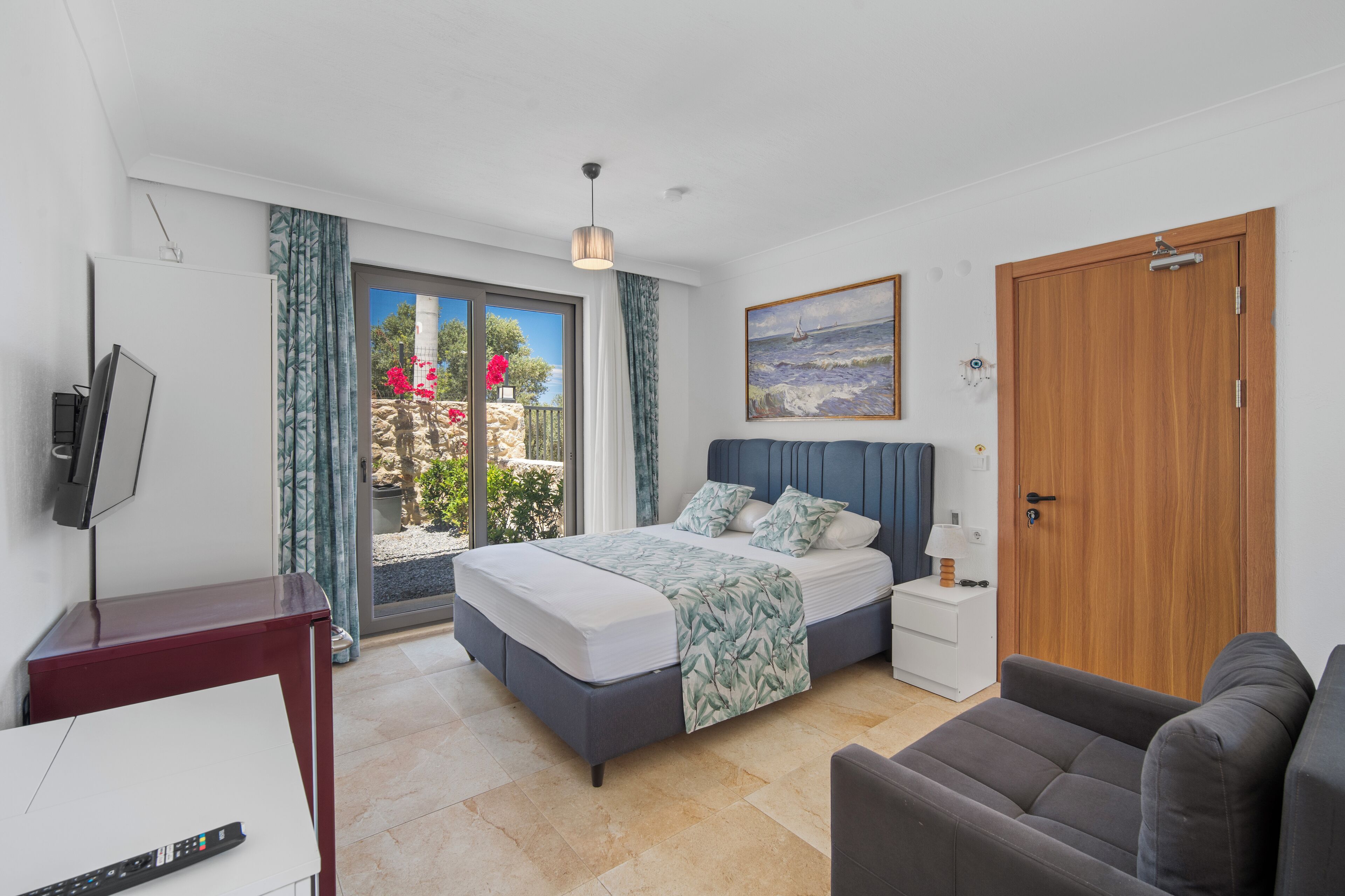 Suite Deluxe | Minibar amb articles gratuïts i roba de llit 