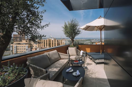 Suite, Balcony | Minibar, in-room safe, desk, blackout drapes