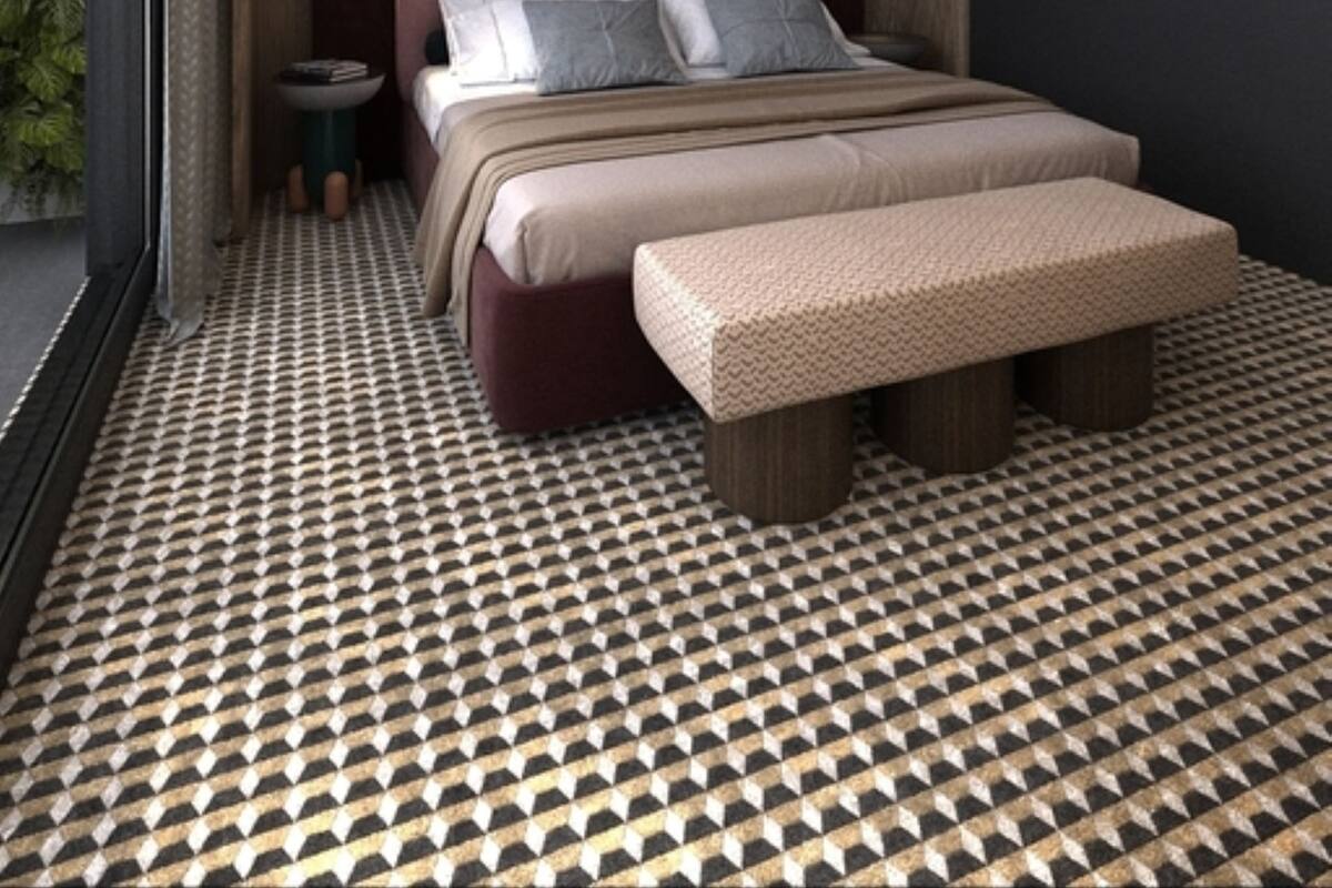 Un dormitorio moderno con una cama grande, un banco y una mesita de noche.