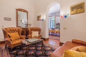 Villa | Living area | 32-inch flat-screen TV with satellite channels, TV, fireplace - Villa Recanati, Val D' Orcia, Private Pool, Jacuzzi, Wifi (Chiusi)