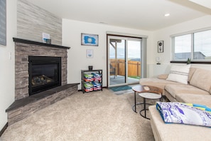 Smart TV, fireplace, books