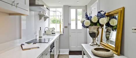 Casa (1 Bedroom) | Cocina privada | Refrigerador, horno, lavavajillas y tostadora