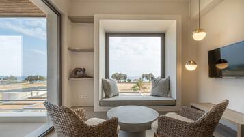 Executive Suite, 2 Bedrooms, Jetted Tub, Sea View | Living area | 45-inch Smart TV with digital channels, TV