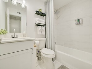 Hair dryer, towels, soap, shampoo