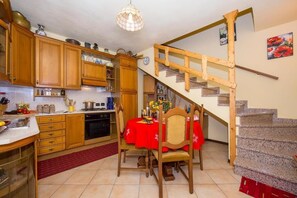 Microwave, stovetop, coffee/tea maker, high chair