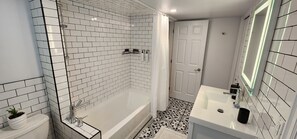 Hair dryer, towels, soap, shampoo