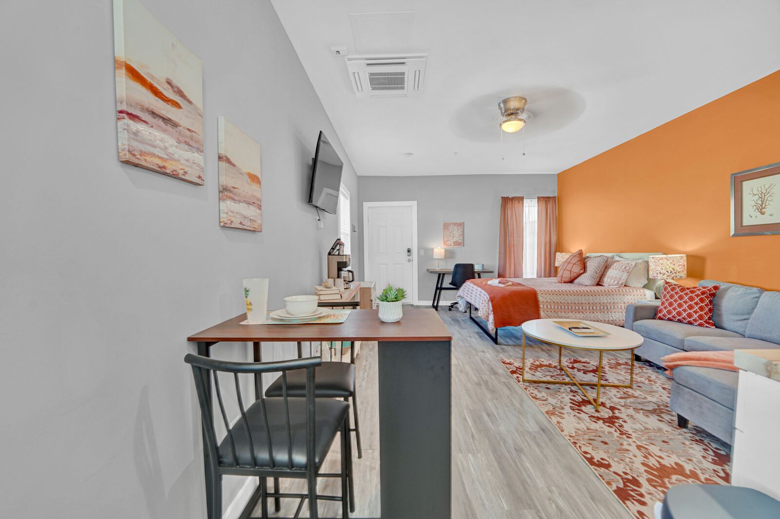 Studio Suite | Individually decorated, individually furnished, desk, laptop workspace