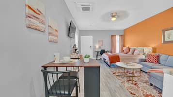 Studio Suite | Individually decorated, individually furnished, desk, laptop workspace