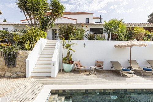 Estoril Contemporary Garden Villa by CadenzaLux