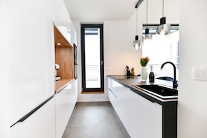 Appartement Deluxe | Cuisine privée | Bouilloire électrique