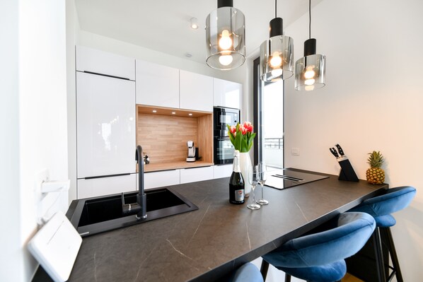 Deluxe Apartment | Private kitchen | Electric kettle