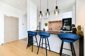 Deluxe Apartment | Private kitchen | Electric kettle