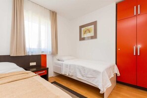 2 quartos, escrivaninha, berço de viagem, Wi-Fi de cortesia