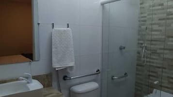 Shower, towels, soap, toilet paper