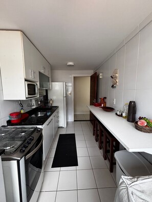 Apartment | Private kitchen | Fridge, microwave, oven, coffee/tea maker