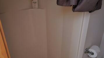 Bathtub, hair dryer, towels