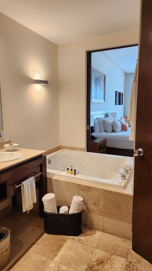 Jetted tub, hair dryer, towels, soap