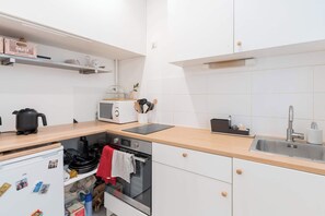 Microwave, coffee/tea maker, cookware/dishes/utensils