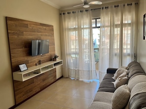 Apartment | Living area | TV - Aconchegante Apartamento na Prainha (Arraial do Cabo)