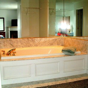 Jetted bath, hair dryer, towels, soap