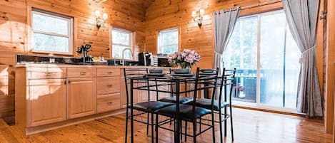 Lovely dining area that comfortably seats four guests 