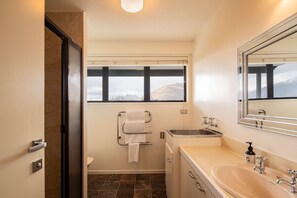 Shower, eco-friendly toiletries, hair dryer, towels