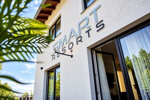 A building with a sign that reads 'SMART RESORTS'.