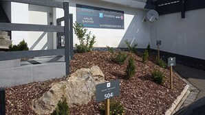 A sign for Smart Resorts Winterberger Str. 3, indicating a winter resort area.