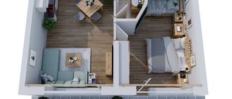 Distribución de un apartamento de dos habitaciones, con comedor, kitchenette y un pequeño balcón.