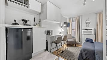 Desk, iron/ironing board, travel cot, free WiFi