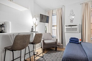Desk, iron/ironing board, travel cot, free WiFi