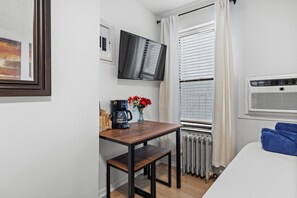 1 bedroom, desk, iron/ironing board, travel cot