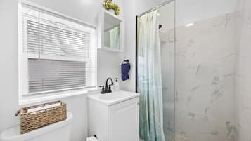 Hair dryer, towels, soap, shampoo