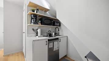 Fridge, microwave, stovetop, coffee/tea maker