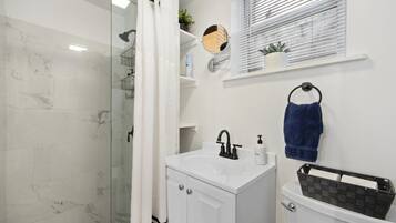 Hair dryer, towels, soap, shampoo