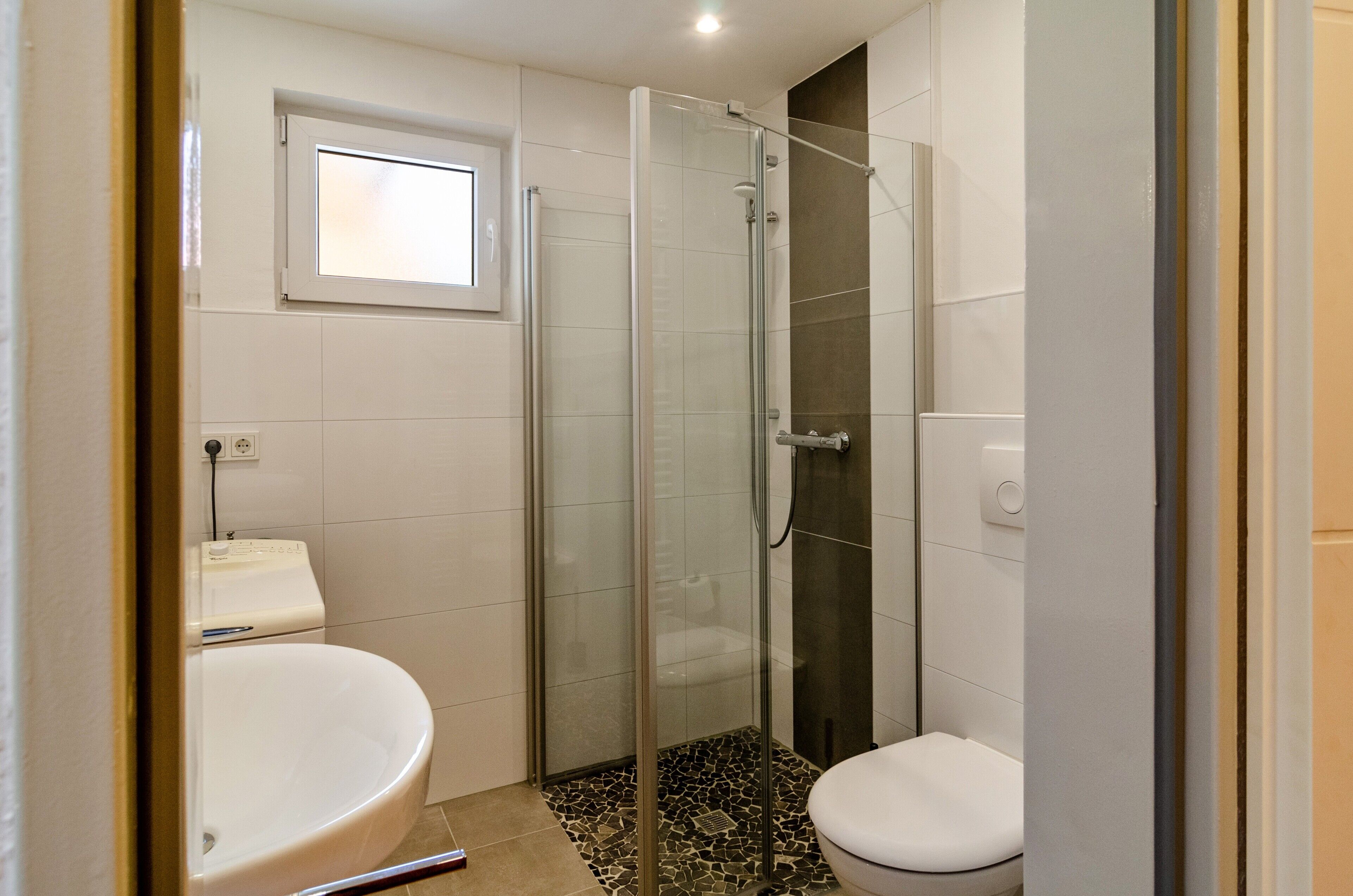 Shower, hair dryer, towels