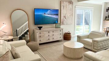 Smart TV, fireplace, books