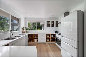 Coffee/tea maker, fridge, microwave, oven