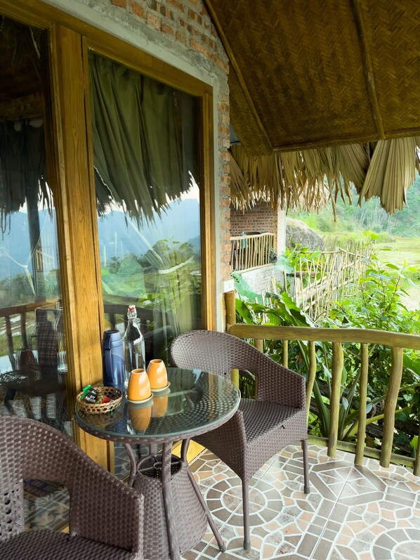 Basic Bungalow, 1 Double Bed, Balcony, Garden View | Terrace/patio