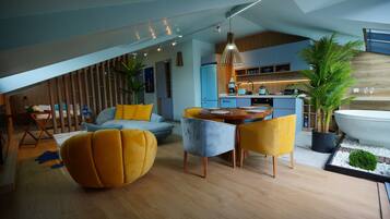 Exclusive Penthouse | Living area | Flat-screen TV