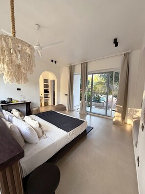 Deluxe Room Triple View Pool | 1 bedroom, minibar, in-room safe, individually decorated