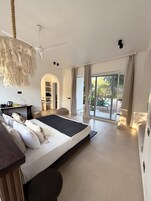 Deluxe Room Triple View Pool | Minibar, in-room safe, individually decorated, individually furnished